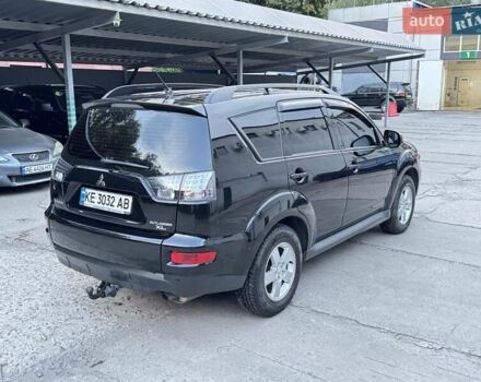 Черный Мицубиси Аутлендер, объемом двигателя 2 л и пробегом 150 тыс. км за 10200 $, фото 2 на Automoto.ua