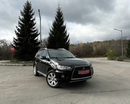 Черный Мицубиси Аутлендер, объемом двигателя 2.2 л и пробегом 237 тыс. км за 11450 $, фото 1 на Automoto.ua