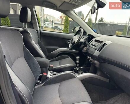 Черный Мицубиси Аутлендер, объемом двигателя 2.2 л и пробегом 226 тыс. км за 10750 $, фото 33 на Automoto.ua