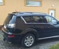 Черный Мицубиси Аутлендер, объемом двигателя 2.2 л и пробегом 209 тыс. км за 12700 $, фото 3 на Automoto.ua