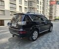 Черный Мицубиси Аутлендер, объемом двигателя 2.27 л и пробегом 188 тыс. км за 11700 $, фото 4 на Automoto.ua