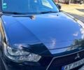 Мицубиси Аутлендер 2011 в Ивано-Франковске на Automoto.ua Черный Мицубиси Аутлендер, объемом двигателя 2.2 л и пробегом 192 тыс. км за 11000 $, фото 1 на Automoto.ua