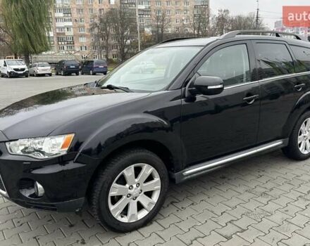 Черный Мицубиси Аутлендер, объемом двигателя 2.2 л и пробегом 226 тыс. км за 10750 $, фото 5 на Automoto.ua