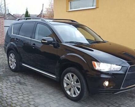 Черный Мицубиси Аутлендер, объемом двигателя 2.2 л и пробегом 209 тыс. км за 12700 $, фото 7 на Automoto.ua