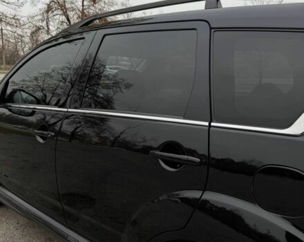 Черный Мицубиси Аутлендер, объемом двигателя 2.2 л и пробегом 253 тыс. км за 12500 $, фото 3 на Automoto.ua