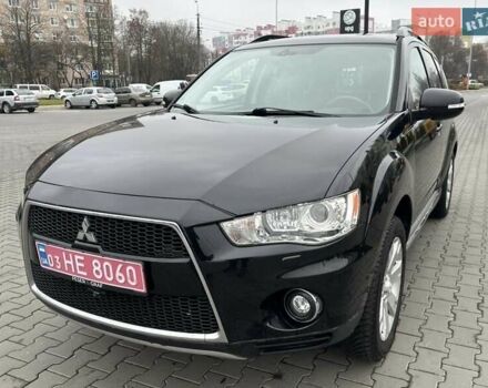 Черный Мицубиси Аутлендер, объемом двигателя 2.2 л и пробегом 226 тыс. км за 10750 $, фото 3 на Automoto.ua