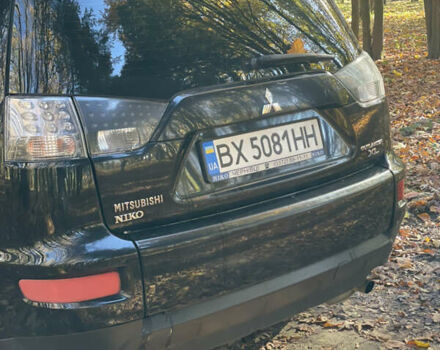 Міцубісі Аутлендер 2011 у Хмельницькому на Automoto.ua Чорний Міцубісі Аутлендер, об'ємом двигуна 2 л та пробігом 196 тис. км за 9500 $, фото 5 на Automoto.ua