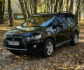 Міцубісі Аутлендер 2011 у Хмельницькому на Automoto.ua Чорний Міцубісі Аутлендер, об'ємом двигуна 2 л та пробігом 196 тис. км за 9500 $, фото 2 на Automoto.ua