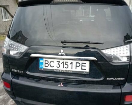 Черный Мицубиси Аутлендер, объемом двигателя 2.3 л и пробегом 255 тыс. км за 11200 $, фото 4 на Automoto.ua