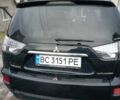 Черный Мицубиси Аутлендер, объемом двигателя 2.3 л и пробегом 255 тыс. км за 11200 $, фото 4 на Automoto.ua
