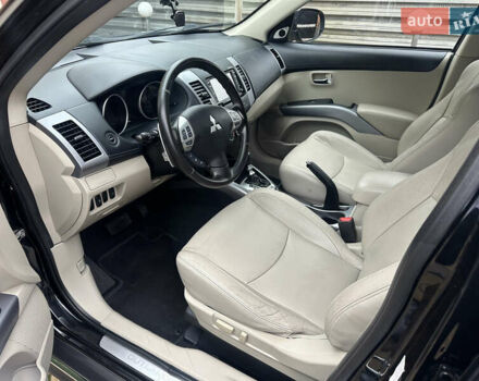 Чорний Міцубісі Аутлендер, об'ємом двигуна 2.2 л та пробігом 216 тис. км за 12000 $, фото 12 на Automoto.ua