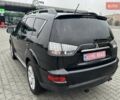 Черный Мицубиси Аутлендер, объемом двигателя 2.2 л и пробегом 226 тыс. км за 10750 $, фото 18 на Automoto.ua