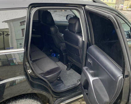 Черный Мицубиси Аутлендер, объемом двигателя 2.27 л и пробегом 233 тыс. км за 10500 $, фото 11 на Automoto.ua