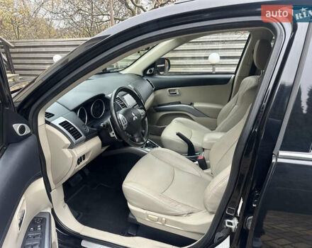 Чорний Міцубісі Аутлендер, об'ємом двигуна 2.2 л та пробігом 216 тис. км за 12000 $, фото 11 на Automoto.ua