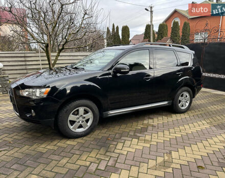 Чорний Міцубісі Аутлендер, об'ємом двигуна 2.2 л та пробігом 216 тис. км за 12000 $, фото 6 на Automoto.ua