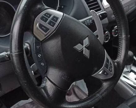 Черный Мицубиси Аутлендер, объемом двигателя 2 л и пробегом 196 тыс. км за 9900 $, фото 19 на Automoto.ua