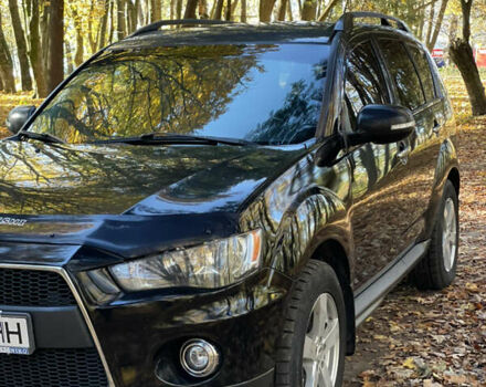 Міцубісі Аутлендер 2011 у Хмельницькому на Automoto.ua Чорний Міцубісі Аутлендер, об'ємом двигуна 2 л та пробігом 196 тис. км за 9500 $, фото 26 на Automoto.ua
