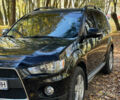 Міцубісі Аутлендер 2011 у Хмельницькому на Automoto.ua Чорний Міцубісі Аутлендер, об'ємом двигуна 2 л та пробігом 196 тис. км за 9500 $, фото 26 на Automoto.ua