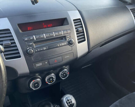 Чорний Міцубісі Аутлендер, об'ємом двигуна 2.4 л та пробігом 93 тис. км за 12500 $, фото 14 на Automoto.ua