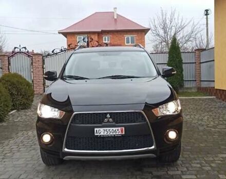 Черный Мицубиси Аутлендер, объемом двигателя 2.2 л и пробегом 209 тыс. км за 12700 $, фото 9 на Automoto.ua