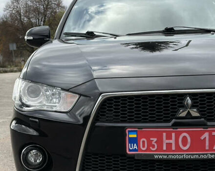 Чорний Міцубісі Аутлендер, об'ємом двигуна 2.2 л та пробігом 236 тис. км за 11399 $, фото 15 на Automoto.ua