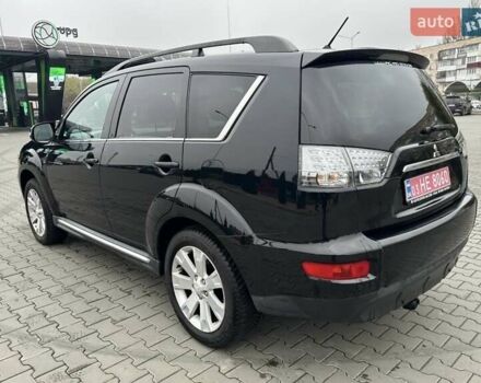 Черный Мицубиси Аутлендер, объемом двигателя 2.2 л и пробегом 226 тыс. км за 10750 $, фото 16 на Automoto.ua