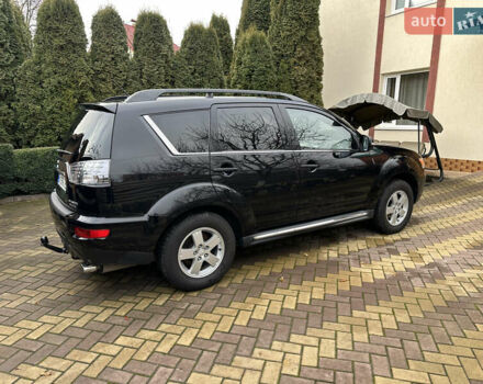 Чорний Міцубісі Аутлендер, об'ємом двигуна 2.2 л та пробігом 216 тис. км за 12000 $, фото 3 на Automoto.ua