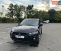 Чорний Міцубісі Аутлендер, об'ємом двигуна 2.4 л та пробігом 177 тис. км за 11900 $, фото 9 на Automoto.ua