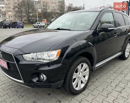 Черный Мицубиси Аутлендер, объемом двигателя 2.2 л и пробегом 226 тыс. км за 10750 $, фото 4 на Automoto.ua