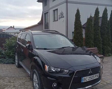 Черный Мицубиси Аутлендер, объемом двигателя 2 л и пробегом 196 тыс. км за 9900 $, фото 4 на Automoto.ua