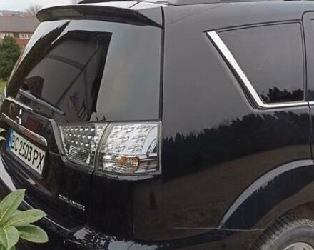 Черный Мицубиси Аутлендер, объемом двигателя 2 л и пробегом 196 тыс. км за 9900 $, фото 23 на Automoto.ua