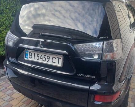 Чорний Міцубісі Аутлендер, об'ємом двигуна 2.3 л та пробігом 271 тис. км за 10500 $, фото 2 на Automoto.ua