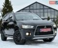 Черный Мицубиси Аутлендер, объемом двигателя 2.3 л и пробегом 189 тыс. км за 10999 $, фото 1 на Automoto.ua