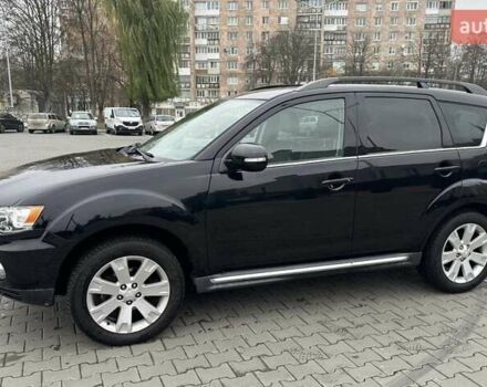 Черный Мицубиси Аутлендер, объемом двигателя 2.2 л и пробегом 226 тыс. км за 10750 $, фото 6 на Automoto.ua