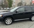 Черный Мицубиси Аутлендер, объемом двигателя 2.2 л и пробегом 226 тыс. км за 10750 $, фото 6 на Automoto.ua