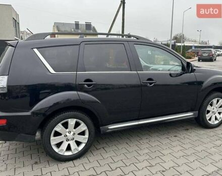 Черный Мицубиси Аутлендер, объемом двигателя 2.2 л и пробегом 226 тыс. км за 10750 $, фото 25 на Automoto.ua