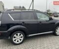 Черный Мицубиси Аутлендер, объемом двигателя 2.2 л и пробегом 226 тыс. км за 10750 $, фото 25 на Automoto.ua