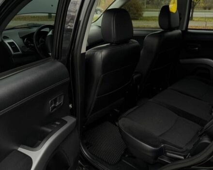 Черный Мицубиси Аутлендер, объемом двигателя 2.2 л и пробегом 253 тыс. км за 12500 $, фото 21 на Automoto.ua