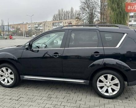 Черный Мицубиси Аутлендер, объемом двигателя 2.2 л и пробегом 226 тыс. км за 10750 $, фото 13 на Automoto.ua