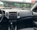Черный Мицубиси Аутлендер, объемом двигателя 2.2 л и пробегом 226 тыс. км за 10700 $, фото 30 на Automoto.ua