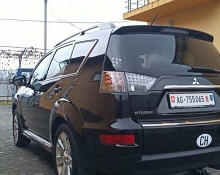 Черный Мицубиси Аутлендер, объемом двигателя 2.2 л и пробегом 209 тыс. км за 12700 $, фото 11 на Automoto.ua