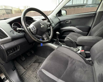 Чорний Міцубісі Аутлендер, об'ємом двигуна 2.36 л та пробігом 96 тис. км за 11700 $, фото 15 на Automoto.ua