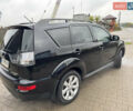 Чорний Міцубісі Аутлендер, об'ємом двигуна 2.36 л та пробігом 96 тис. км за 11700 $, фото 2 на Automoto.ua