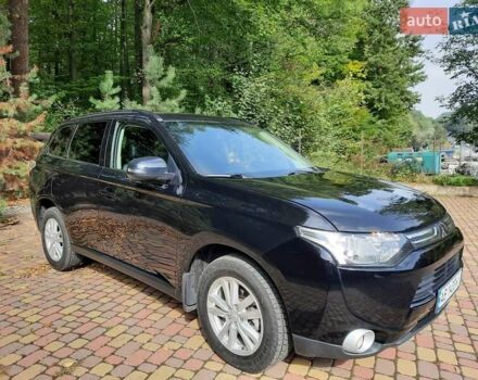 Черный Мицубиси Аутлендер, объемом двигателя 2.27 л и пробегом 256 тыс. км за 13600 $, фото 3 на Automoto.ua