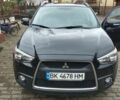 Міцубісі Аутлендер 2012 у Костополе на Automoto.ua Чорний Міцубісі Аутлендер, об'ємом двигуна 1.8 л та пробігом 248 тис. км за 10500 $, фото 1 на Automoto.ua