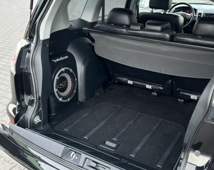 Черный Мицубиси Аутлендер, объемом двигателя 2.3 л и пробегом 124 тыс. км за 11999 $, фото 20 на Automoto.ua