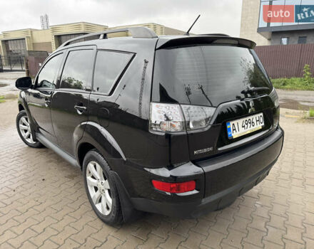 Чорний Міцубісі Аутлендер, об'ємом двигуна 2.36 л та пробігом 96 тис. км за 11700 $, фото 4 на Automoto.ua