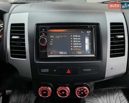 Черный Мицубиси Аутлендер, объемом двигателя 2.2 л и пробегом 188 тыс. км за 10999 $, фото 61 на Automoto.ua