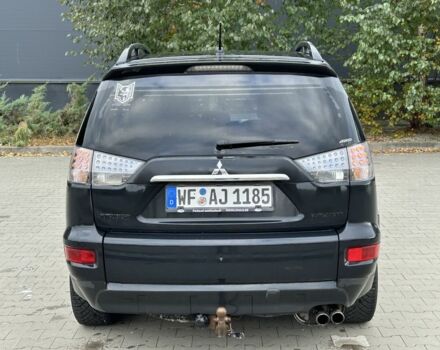 Черный Мицубиси Аутлендер, объемом двигателя 2 л и пробегом 250 тыс. км за 4850 $, фото 3 на Automoto.ua