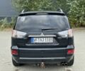 Черный Мицубиси Аутлендер, объемом двигателя 2 л и пробегом 250 тыс. км за 4850 $, фото 3 на Automoto.ua